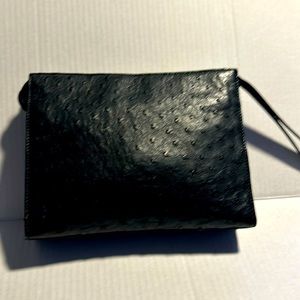 Donna Lona ostrich leather wristlet